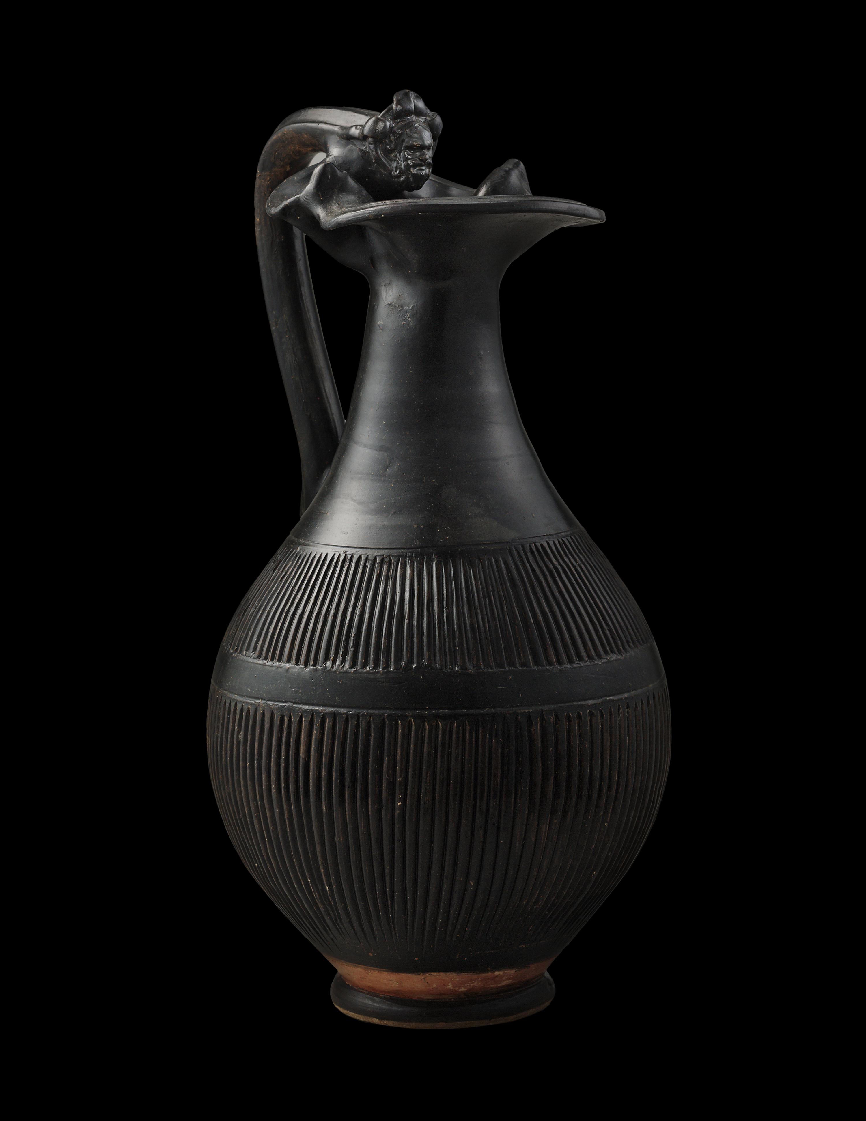 An Apulian Black-Glazed Oinochoe