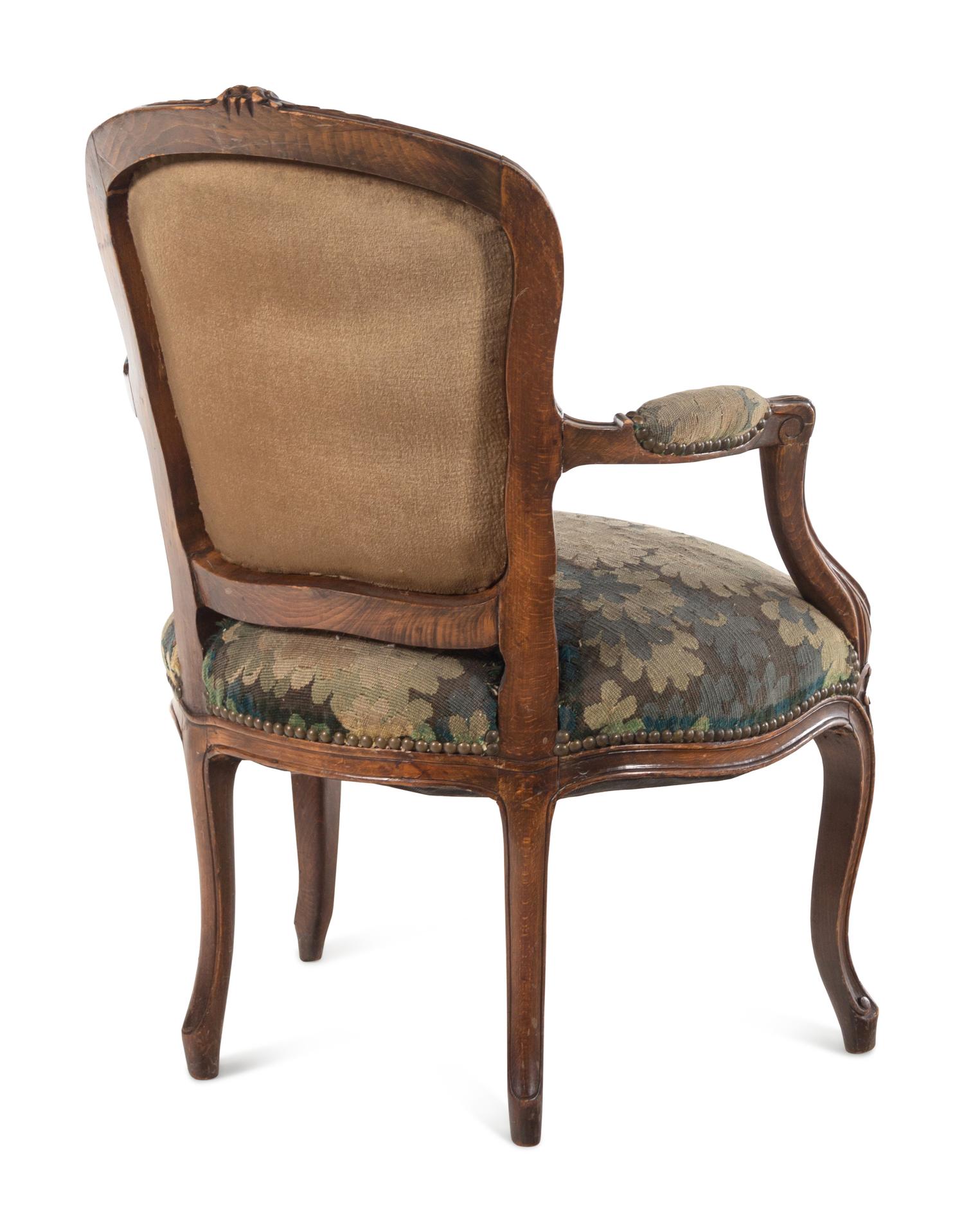 A Louis XV Style Tapestry Upholstered Fruitwood Fauteuil