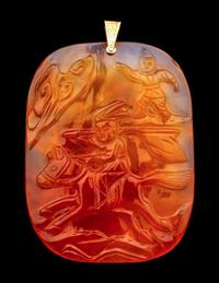 A Group of Chinese Red Carnelian and Coral Pendants