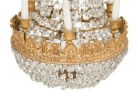 An Empire Style Gilt Metal and Cut Glass Six-Light Chandelier