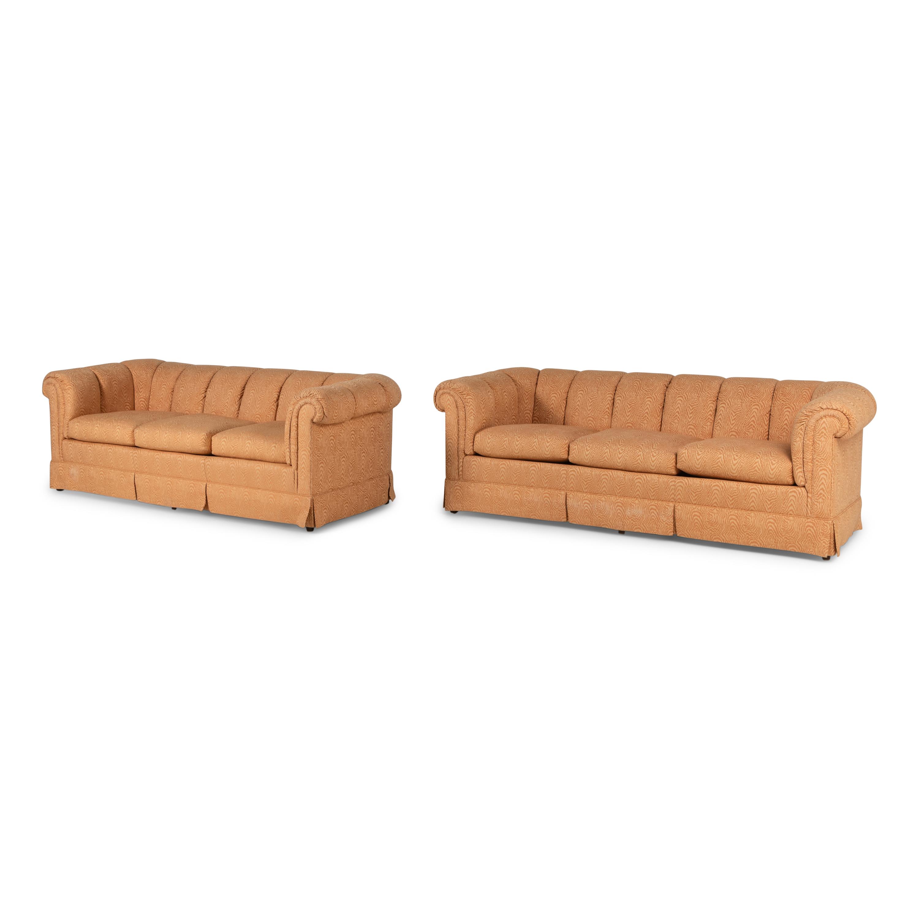 A Pair of Custom Upholstered Three-Cushion Roll-Arm Sofas