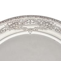 A Sterling Silver Floral Repousse Dished Tray in the Champlain Pattern