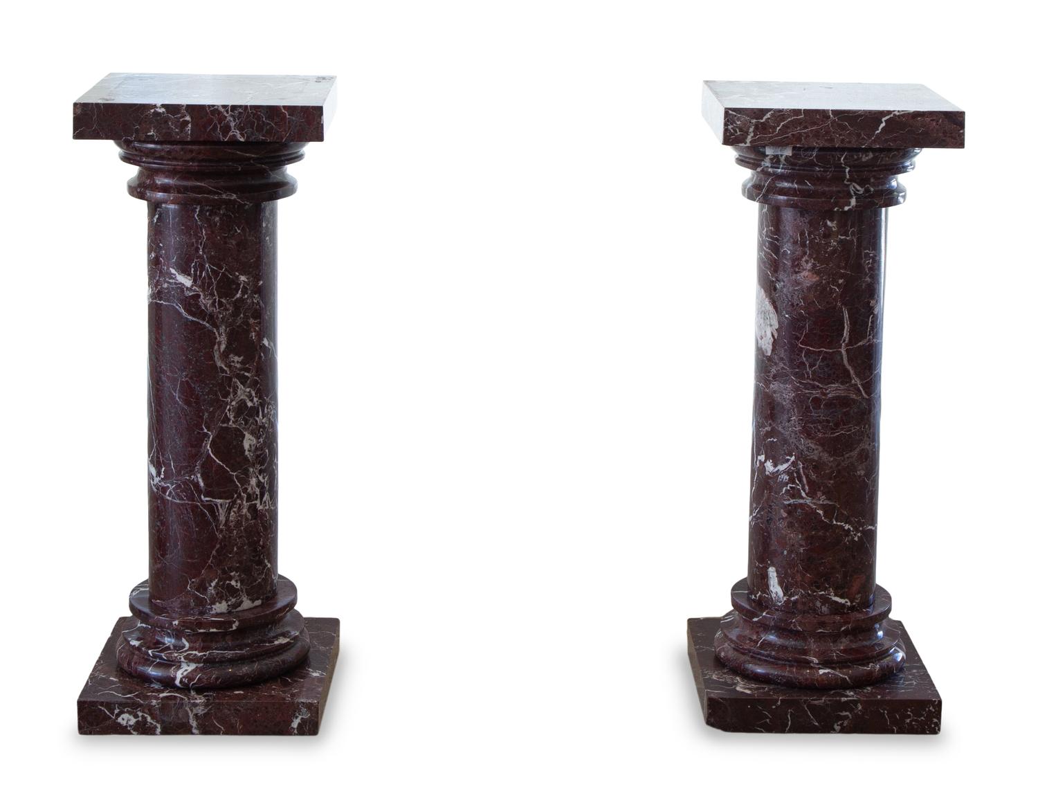A Pair of Rouge Marble Pedestals