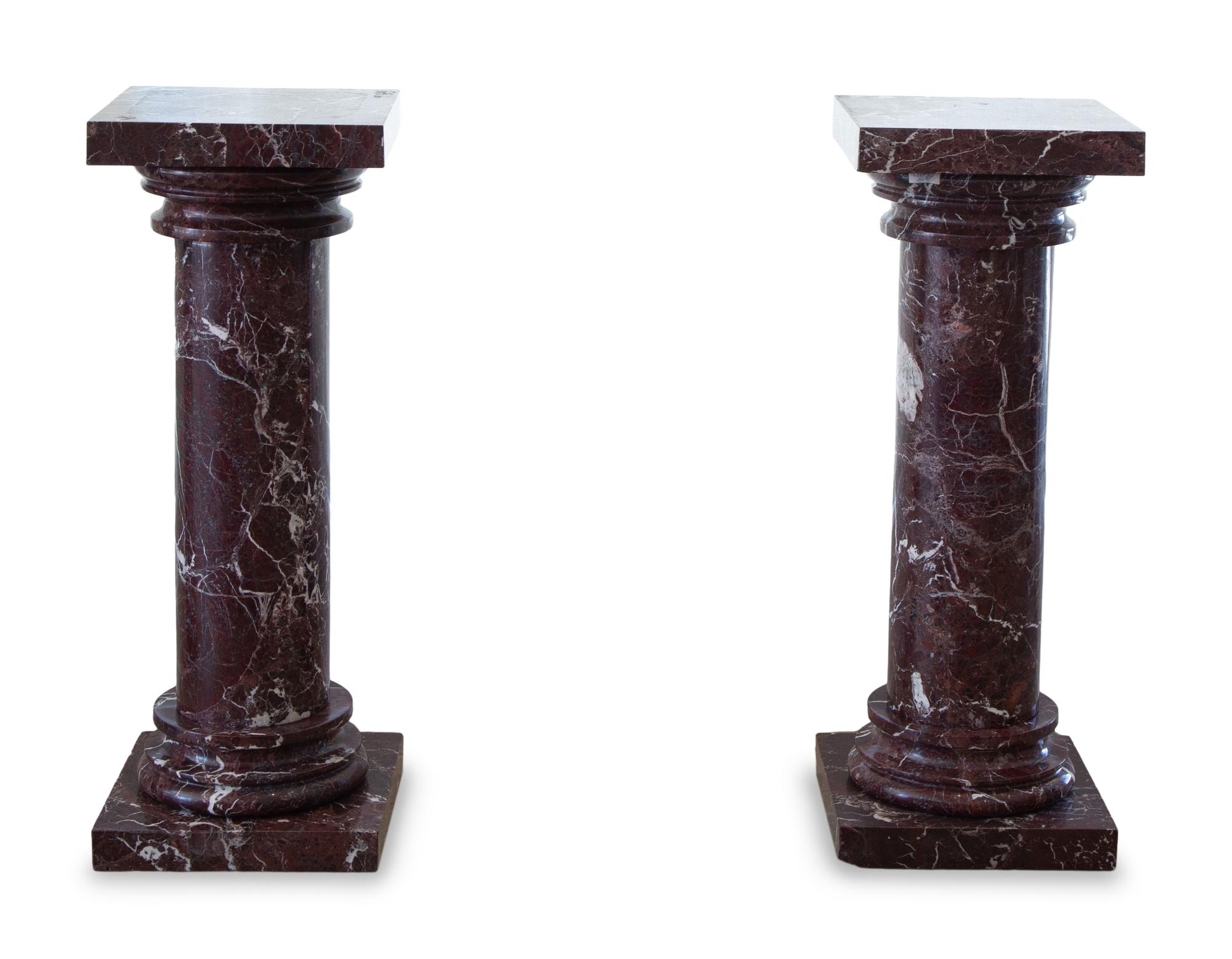 A Pair of Rouge Marble Pedestals