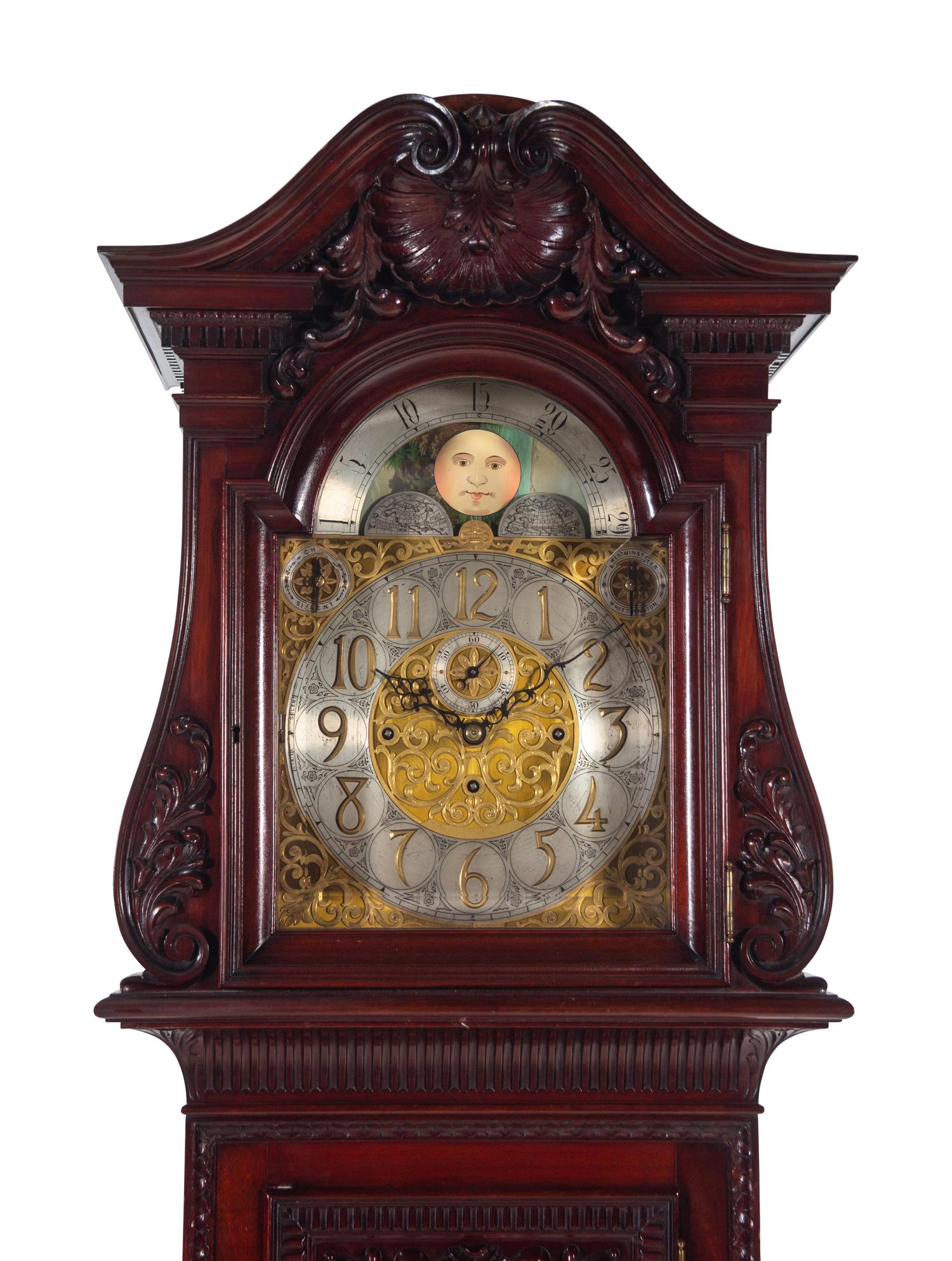 A Herschede Carved Mahogany Nine-Tube Tall Case Clock