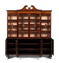 An English Mahogany and Marquetry Breakfront Bookcase