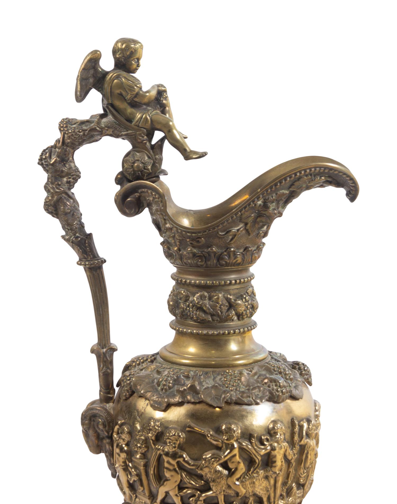 A Pair of Neoclassical Brass Ewers