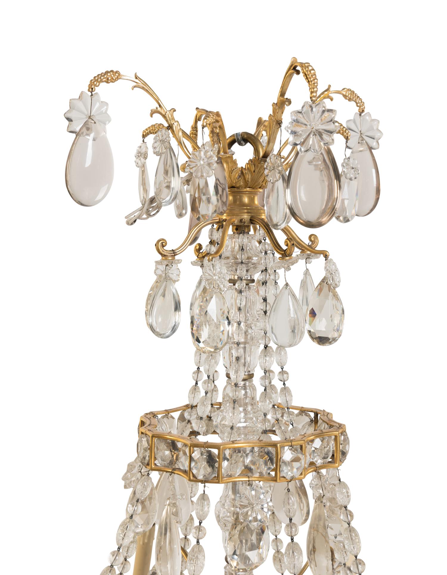 A Gilt Bronze and Cut Glass Eight-Light Chandelier