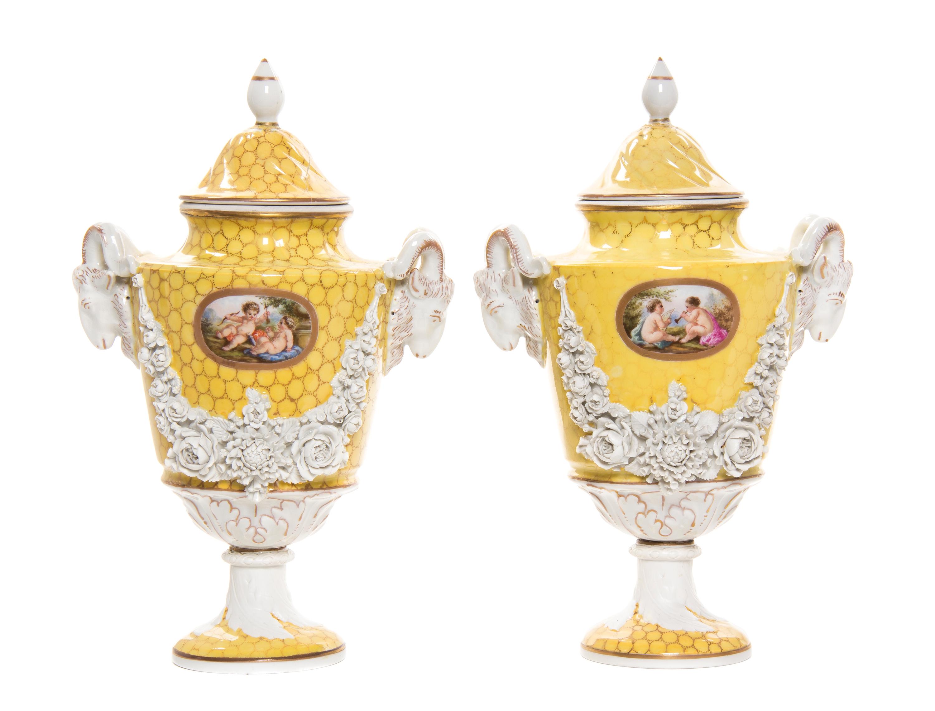 A Pair of Sevres Porcelain Covered Urns, Height 12 1/2 inches.