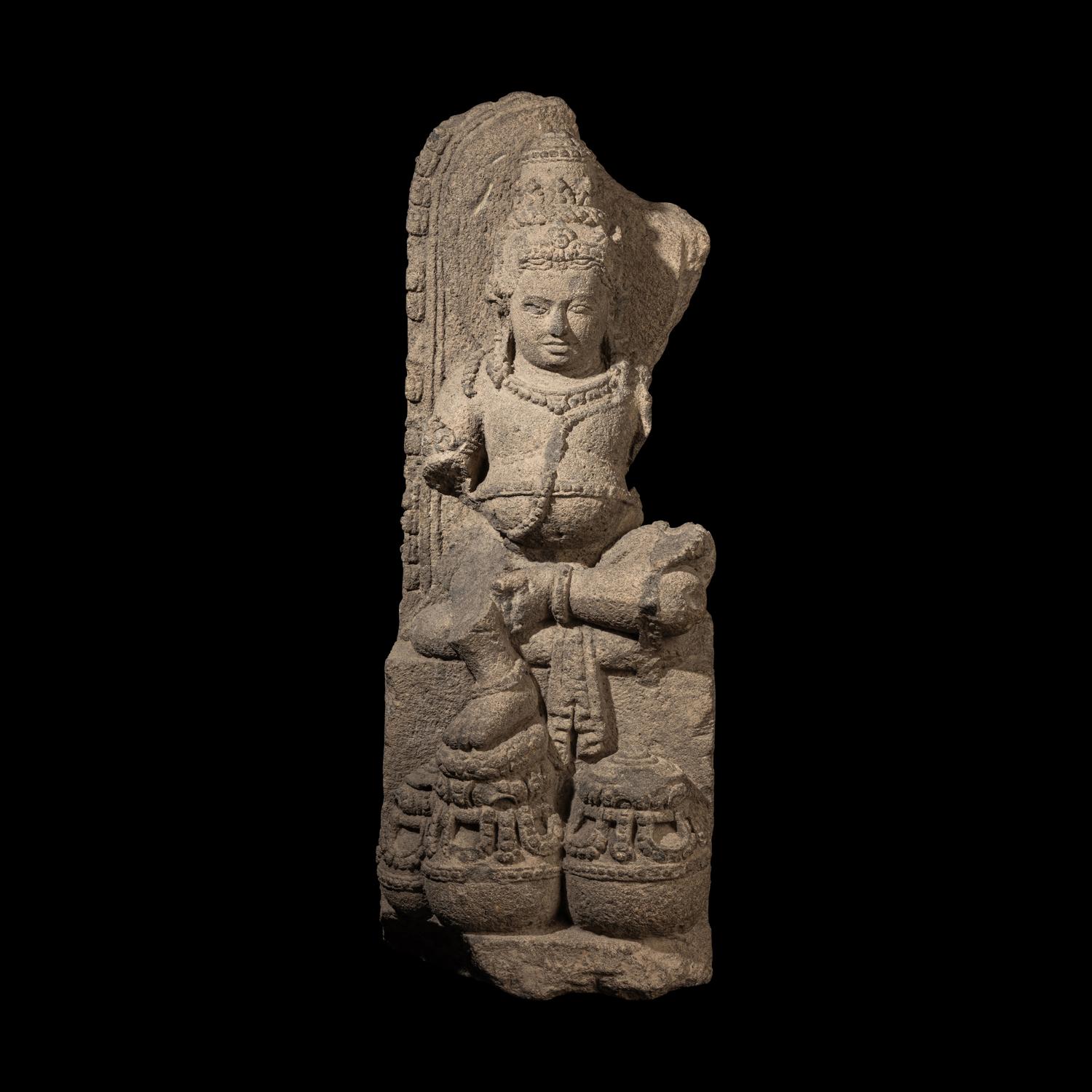 An Indonesia Figure of Kubera, Central Java, 9th Century 九世紀 爪窪石雕毗罗坐像
