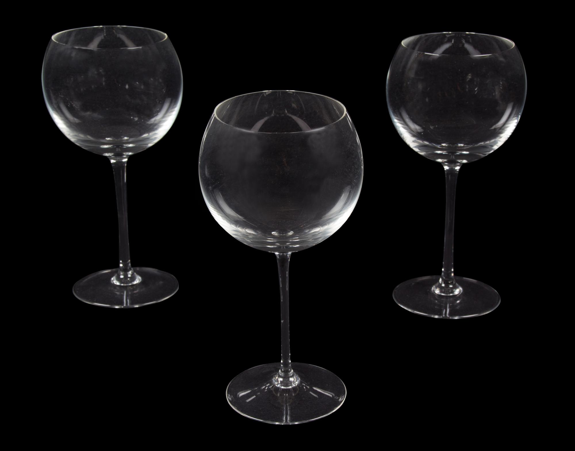 A Set of Fifteen Glass Wine Glasses Height 9 1/8 inches.