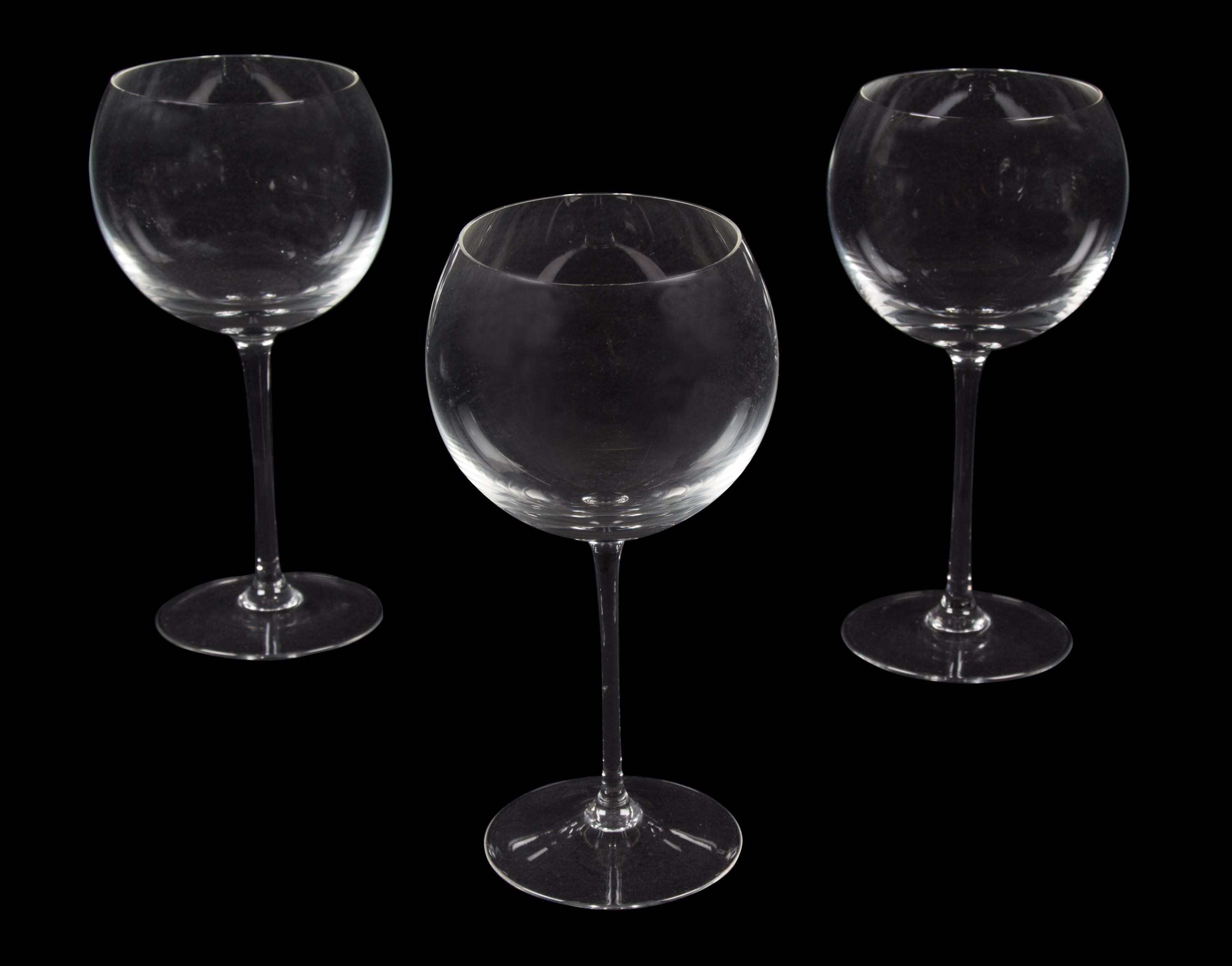 A Set of Fifteen Glass Wine Glasses Height 9 1/8 inches.
