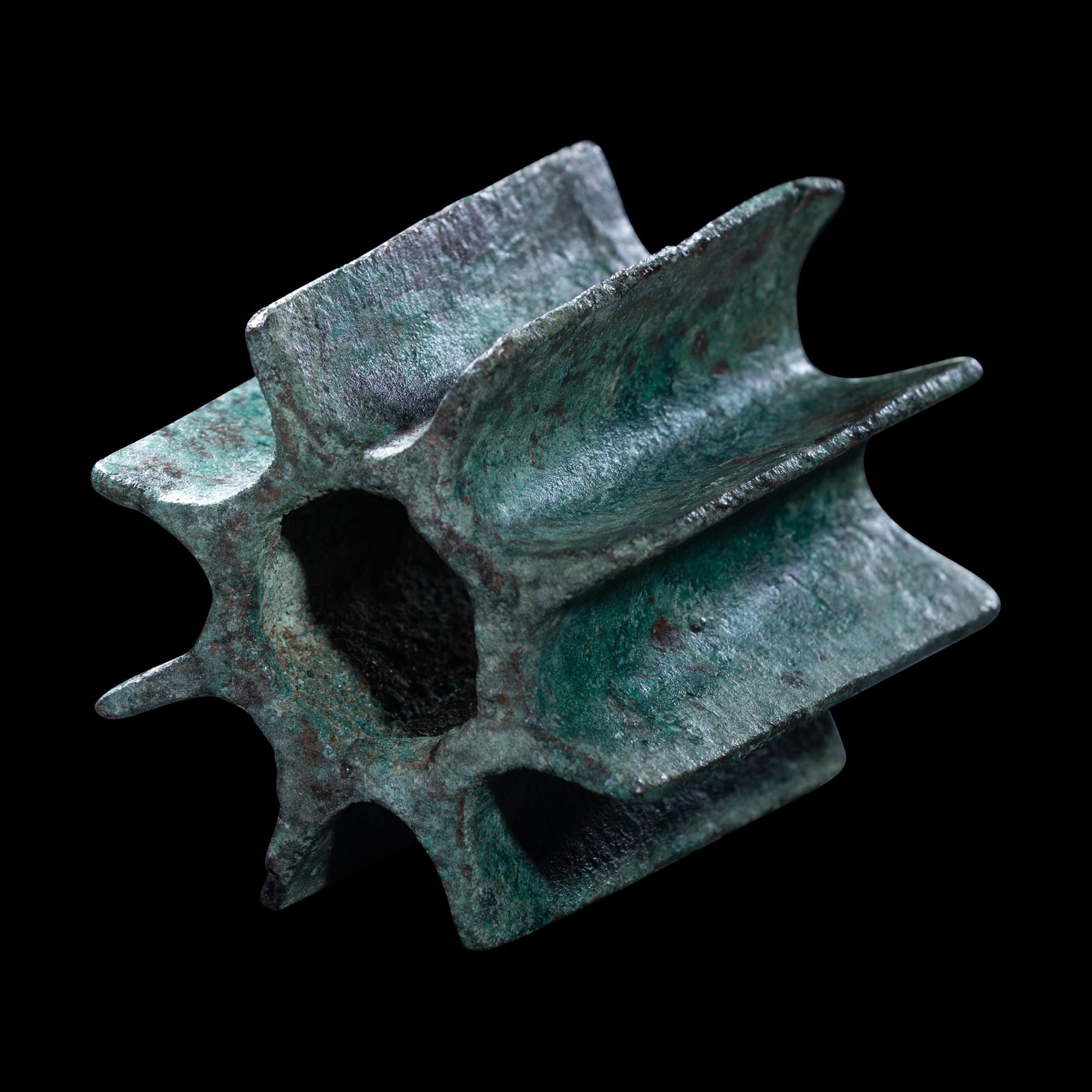 A Viscus Bronze Fluted Mace Head