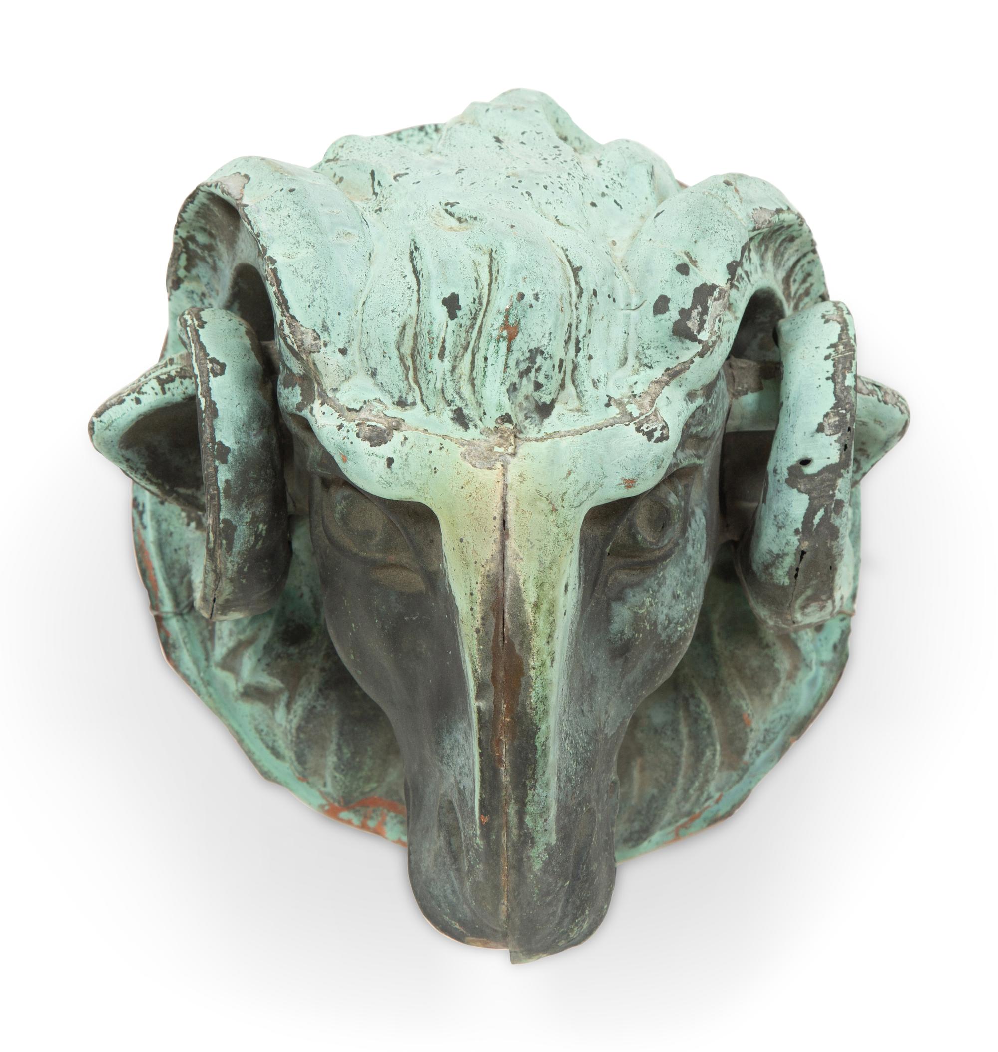 A Pair of Tole Ram's Heads
