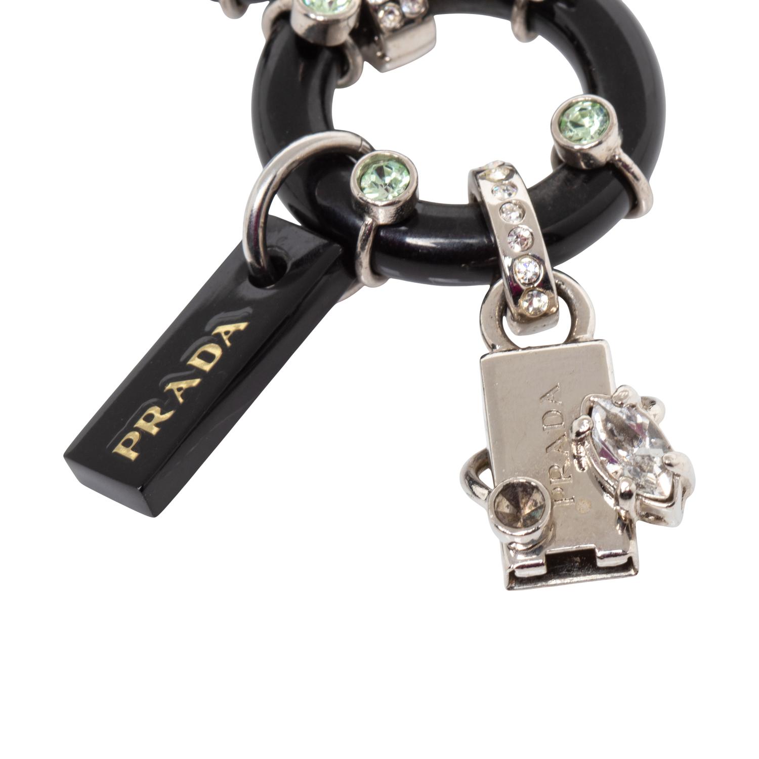PRADA; NECKLACE, BROOCH, AND BRACELET
