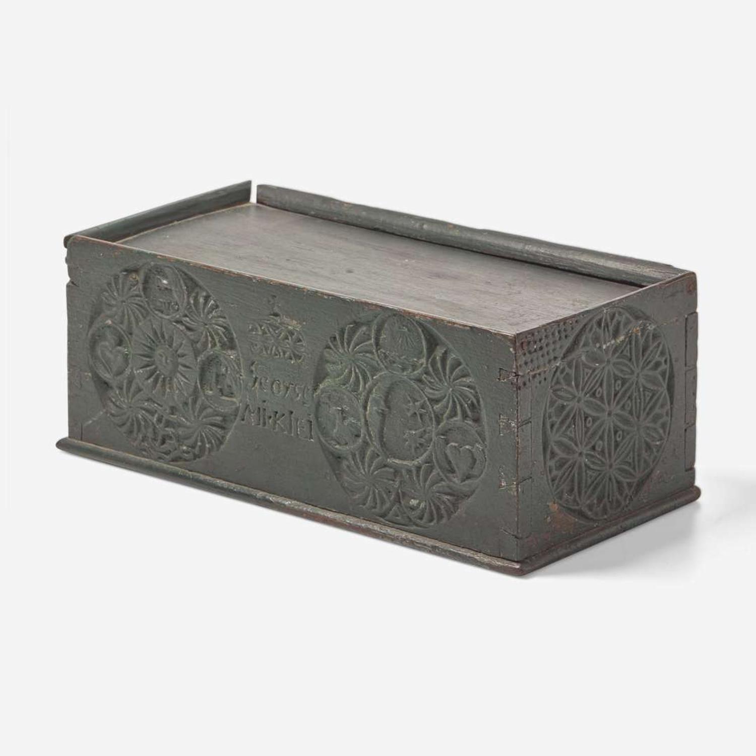 An assorted collection of nine carved and paint-decorated boxes and busk; American and Northern European, 18th / 19th century