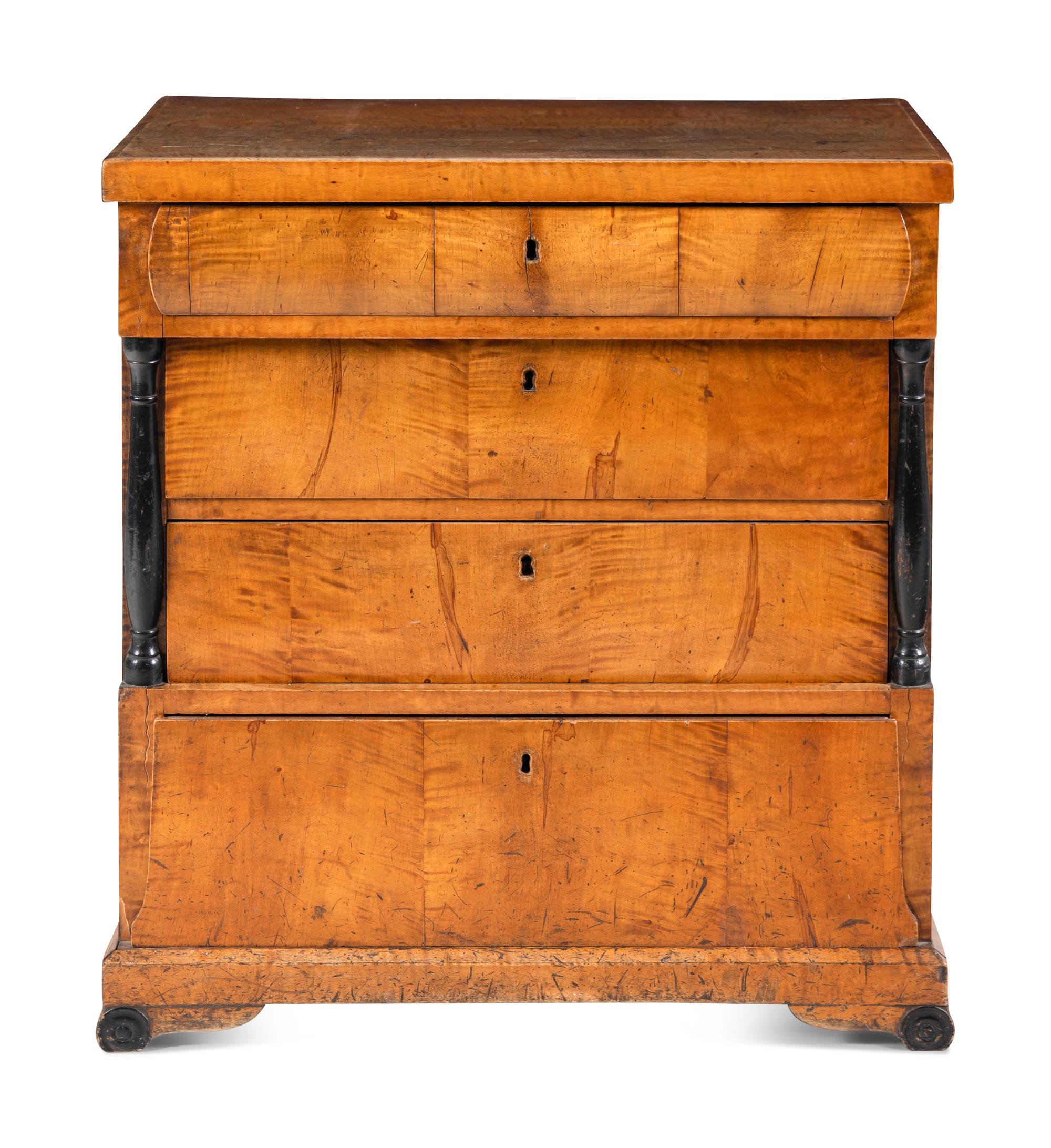A Biedermeier Maple Chest of Drawers