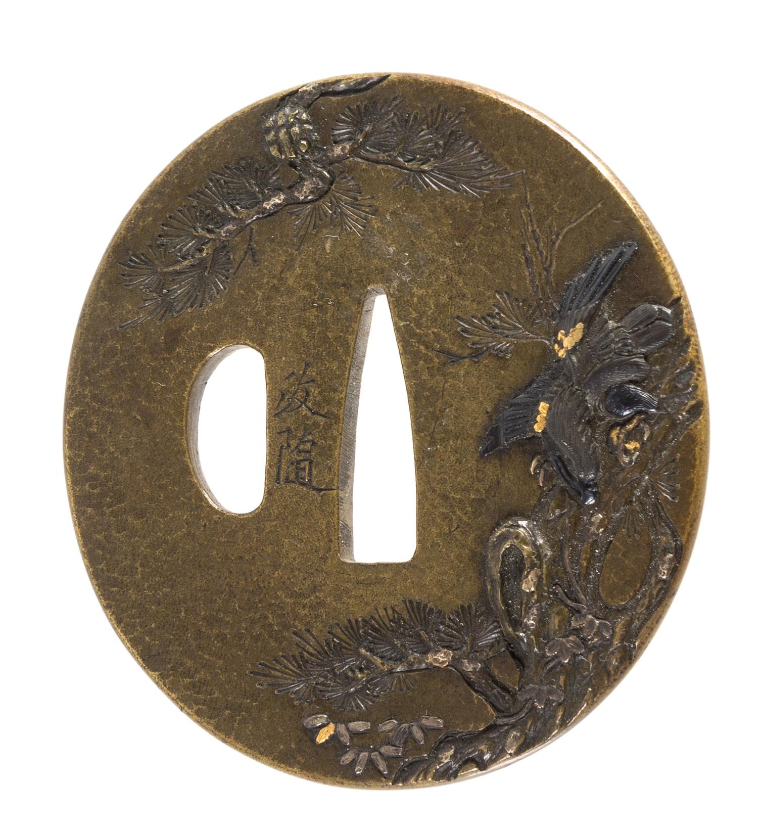 A Copper Tsuba Height 2 1/2 inches.