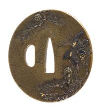 A Copper Tsuba Height 2 1/2 inches.