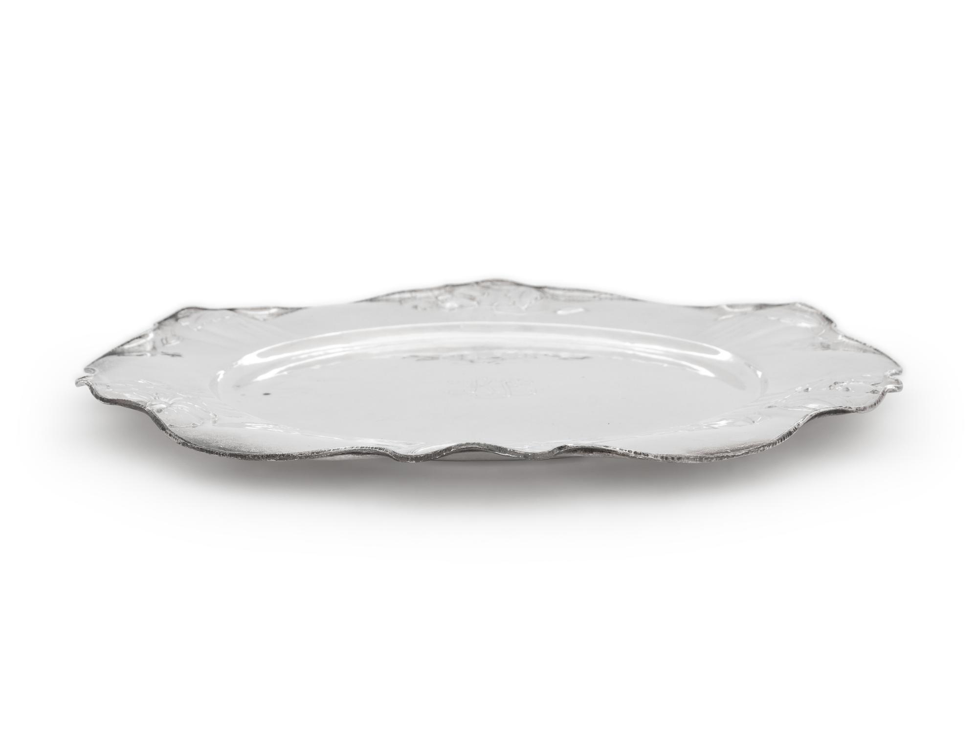 A Set of Eleven Gorham Martelé Silver Chargers