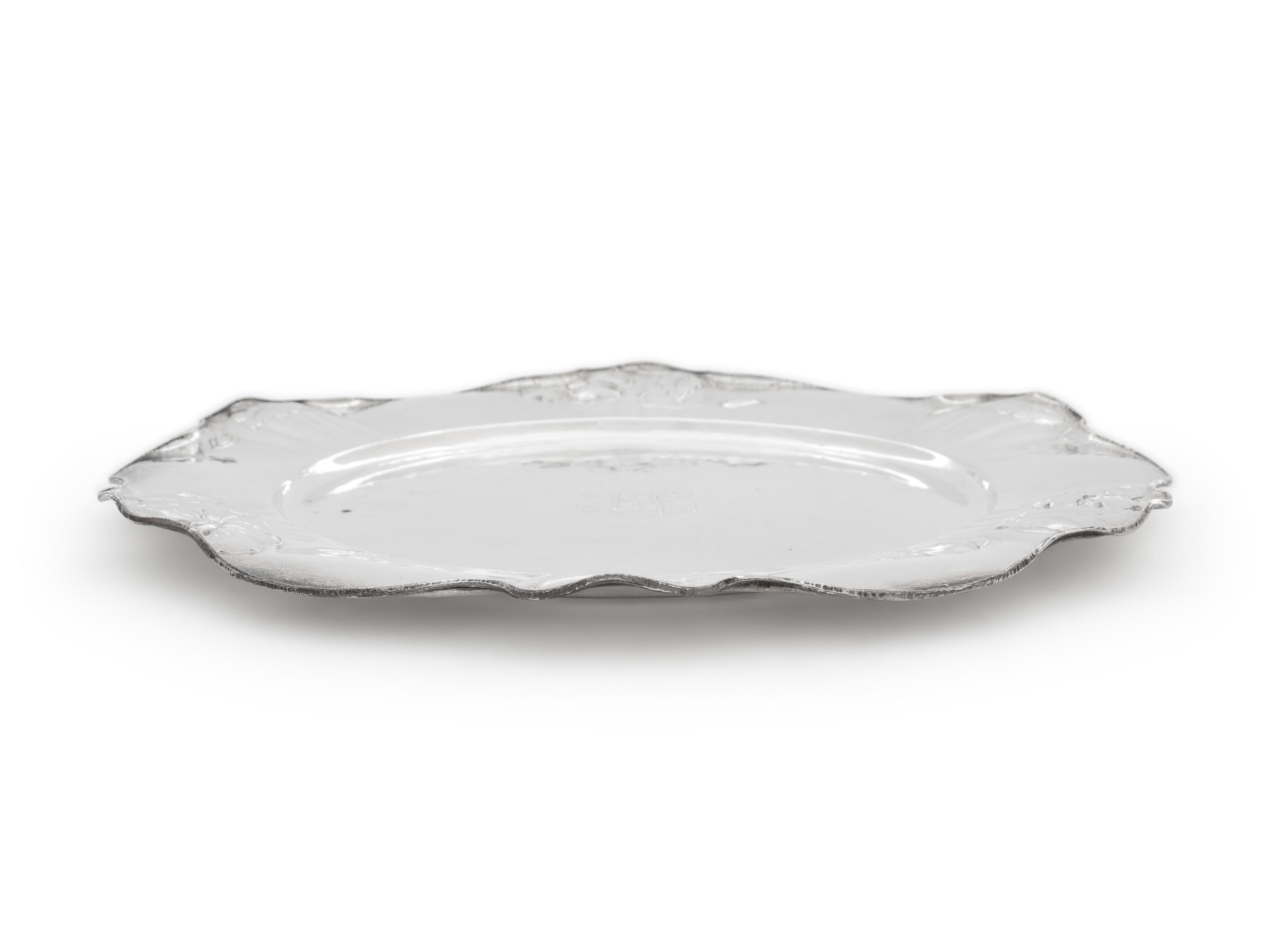 A Set of Eleven Gorham Martelé Silver Chargers