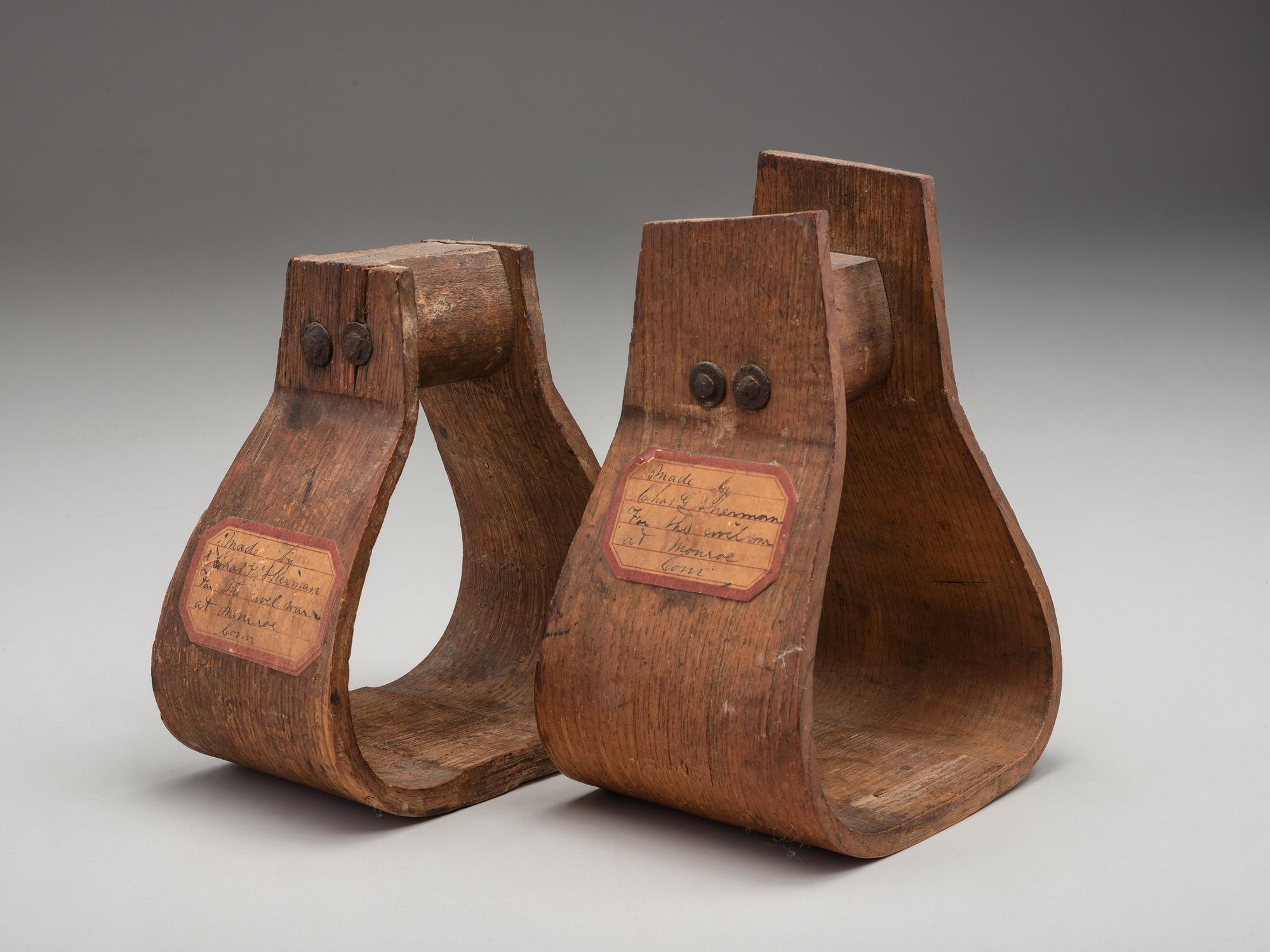 [CIVIL WAR]. Two Civil War stirrups. Made by Charles G. Sherman, Monroe, CT.