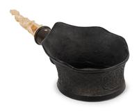 A Chinese Silk Iron with a Figural Handle