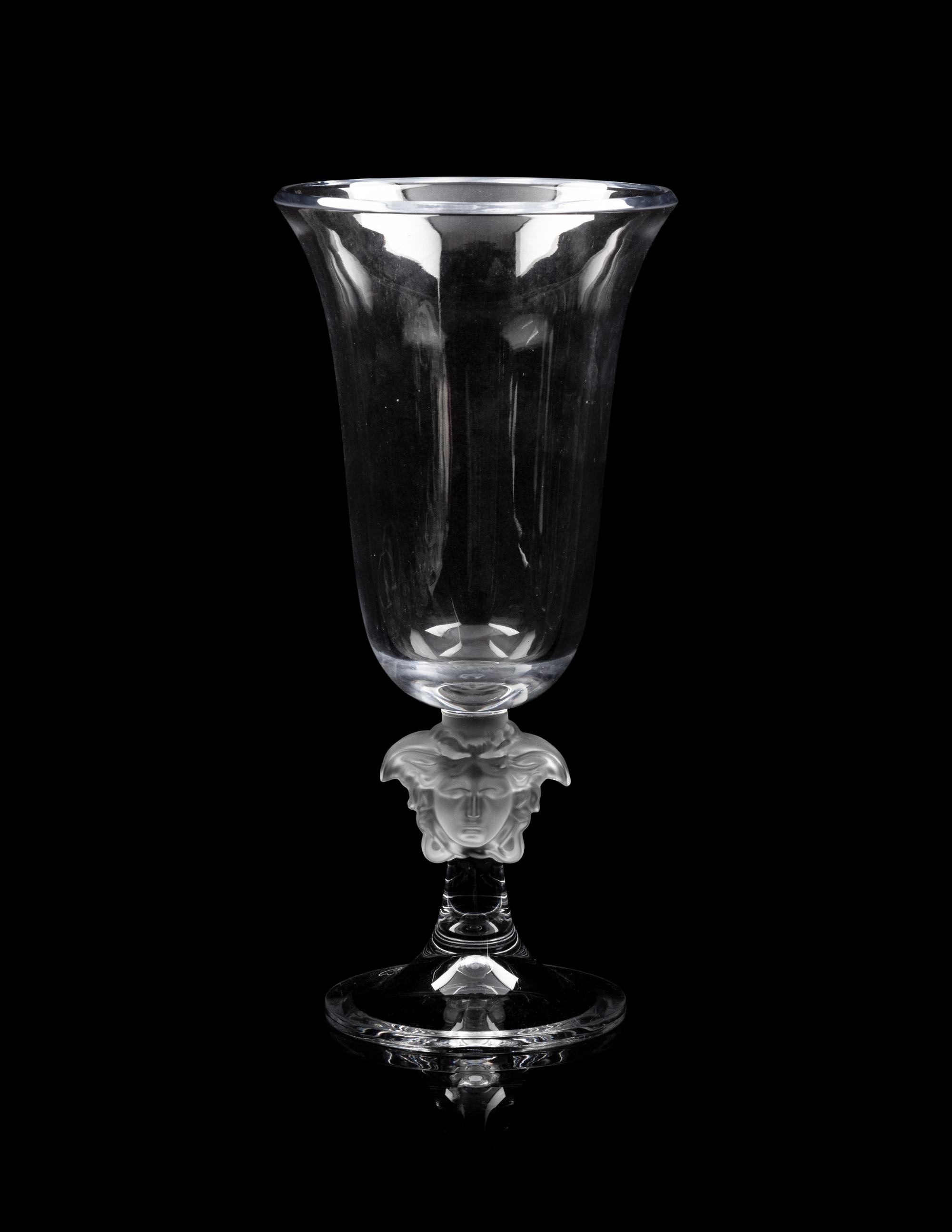A Group of Versace Medusa Lumiere Glass Articles