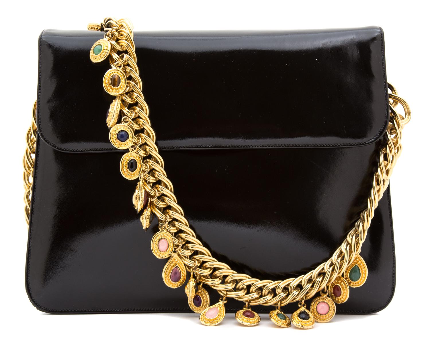 A Judith Leiber Black Leather Flap Handbag, 8" x 7" x 2.5".