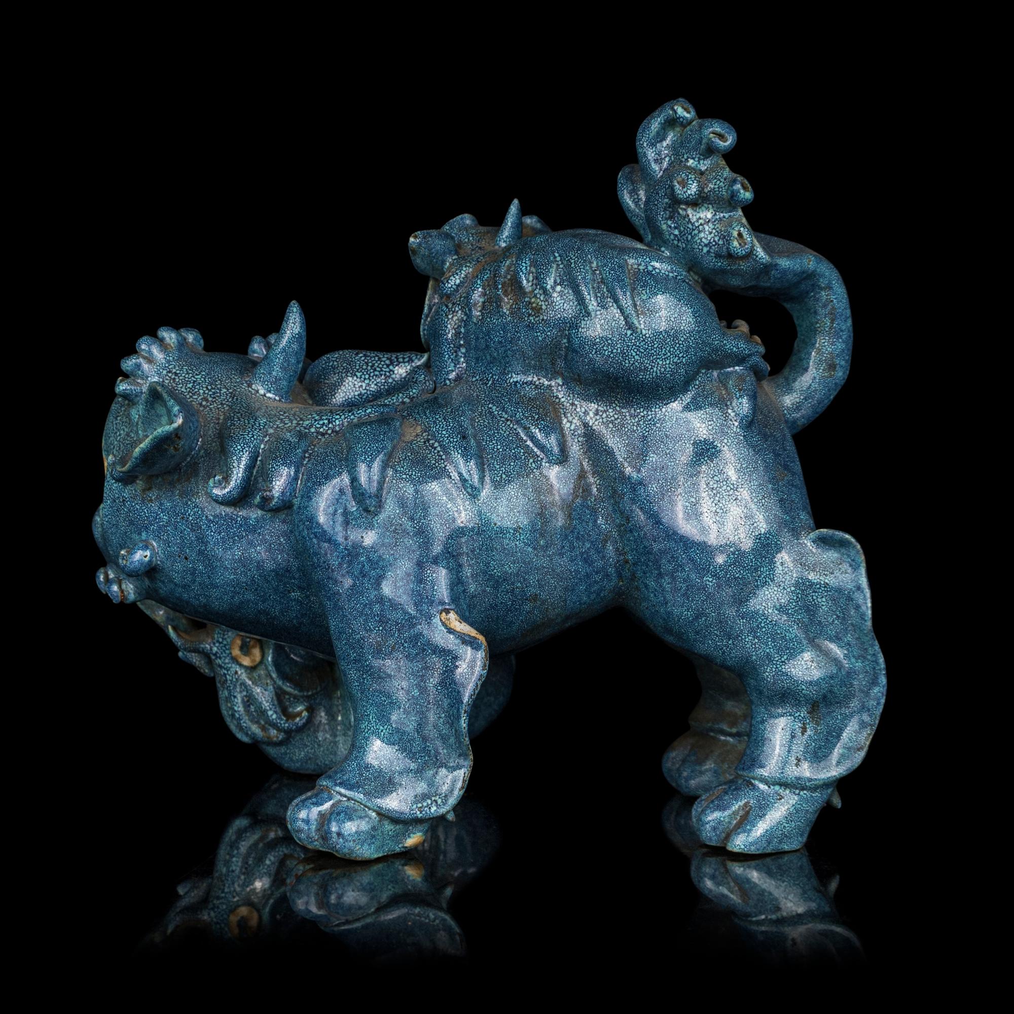 A Chinese Robin's Egg Glazed Porcelain Figural Group of Fu Lions