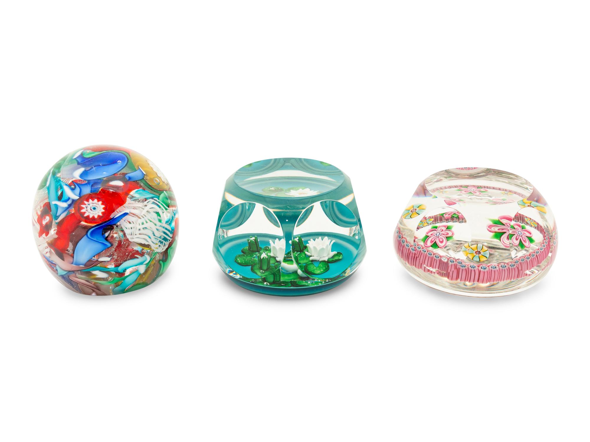 A Group of Seven Millefiori Glass Paperweights