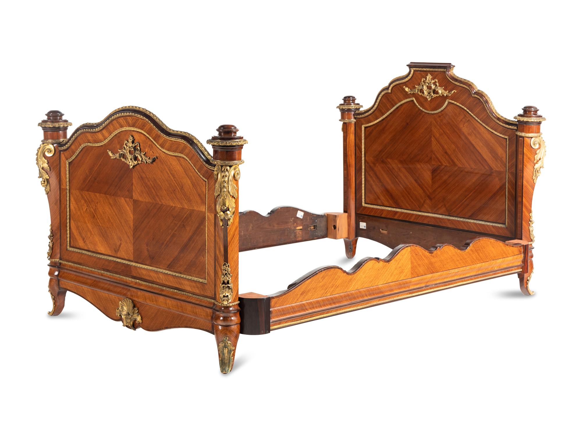 A Louis XV Style Gilt Bronze Mounted Kingwood Bed Frame