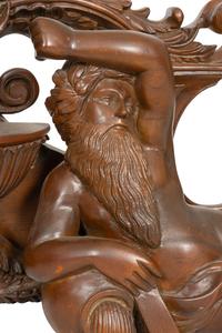 An Italian Renaissance Style Carved Mahogany Figural Transom