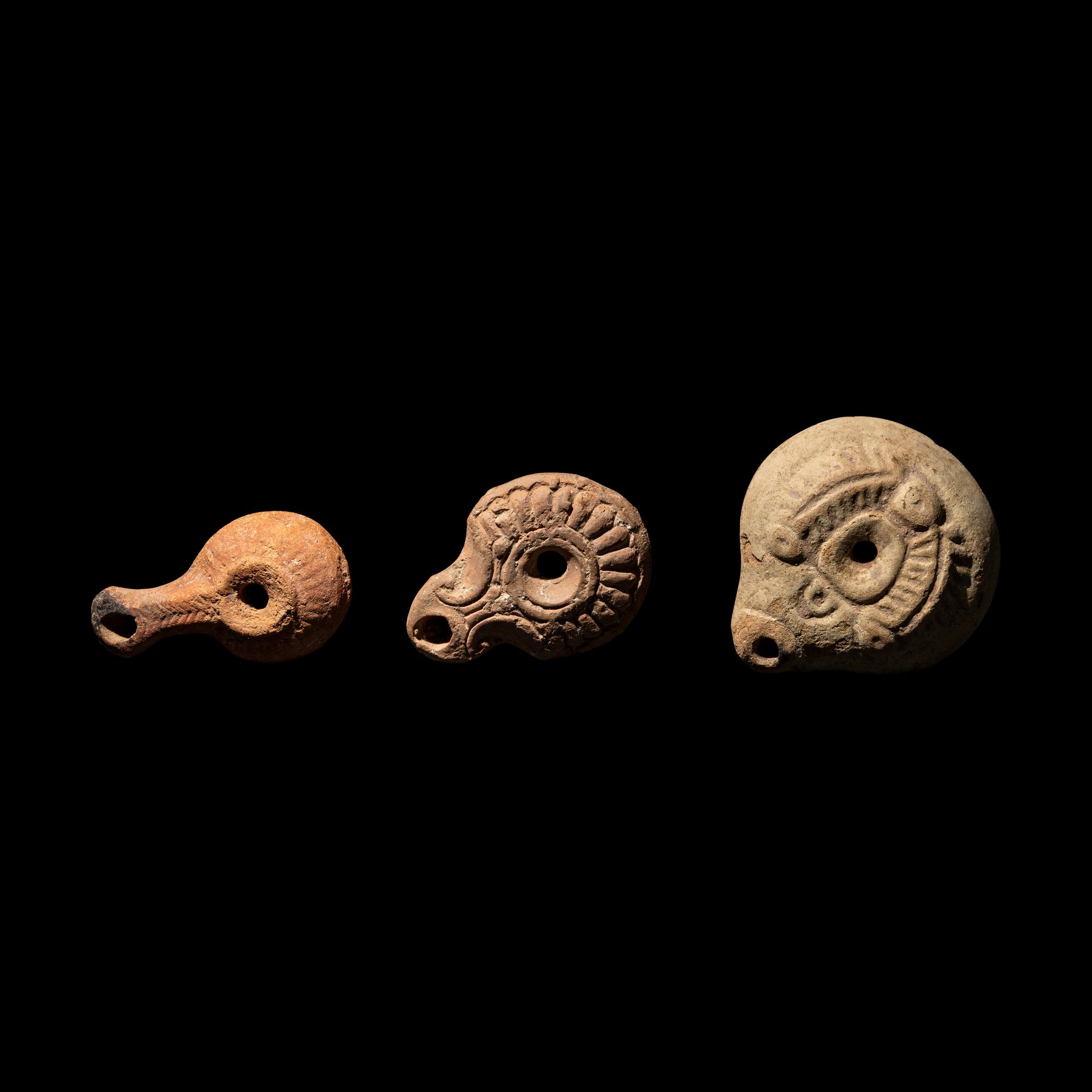 Three Roman Terracotta Oil Lamps