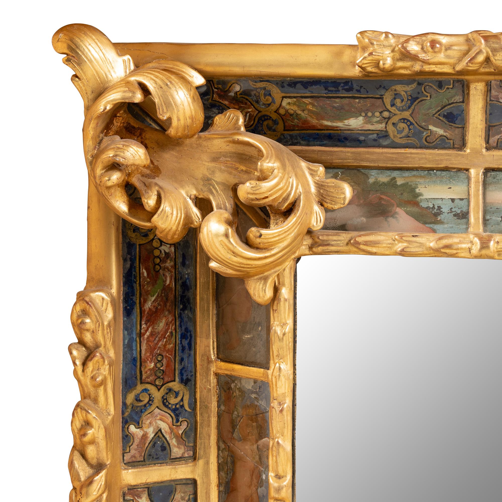 A Flemish Ebonized, Parcel Gilt and Reverse Painted Mirror