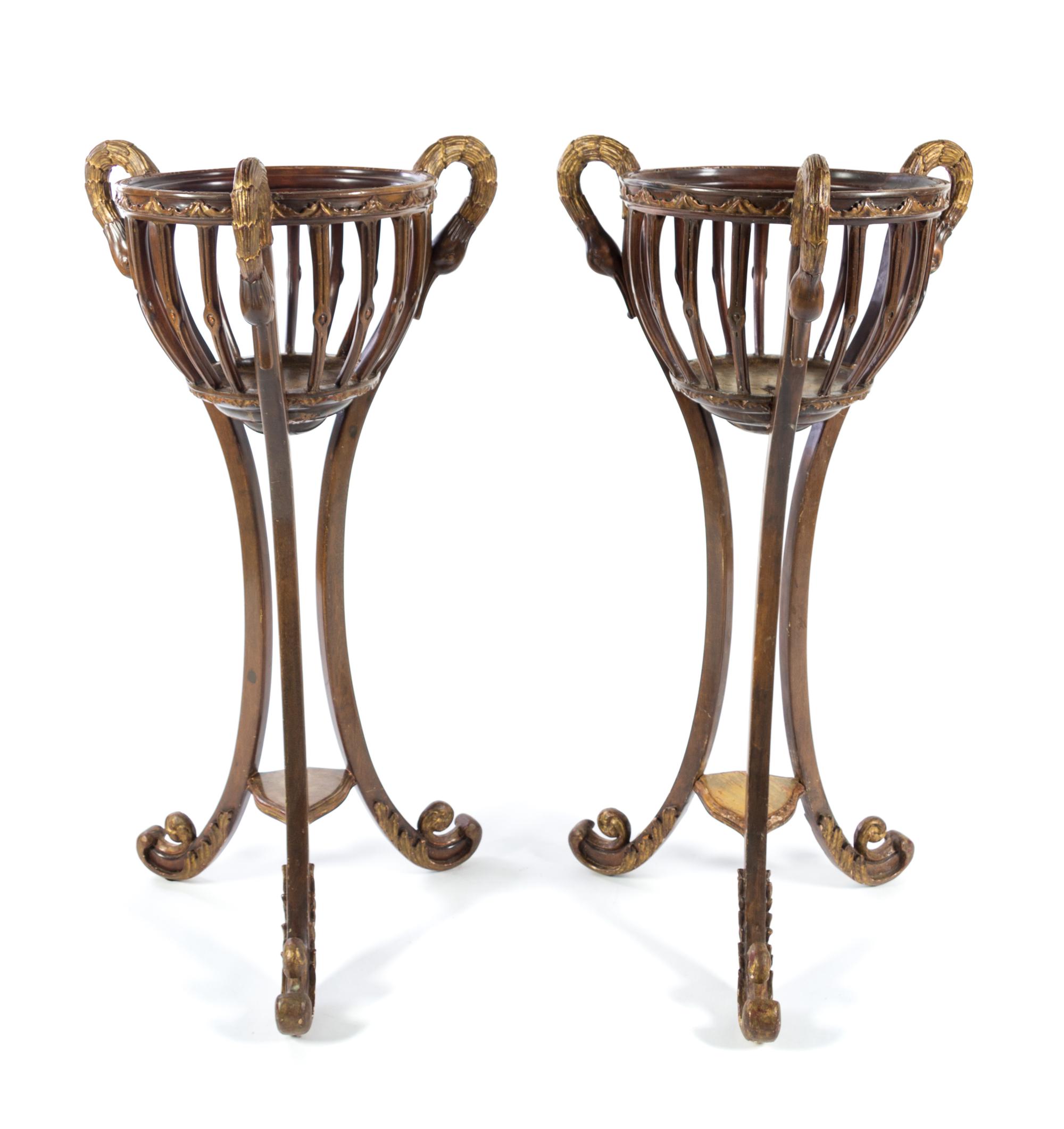 A Pair of Regency Style Painted and Parcel Gilt Jardinieres Height 48 inches. — 20TH CENTURY