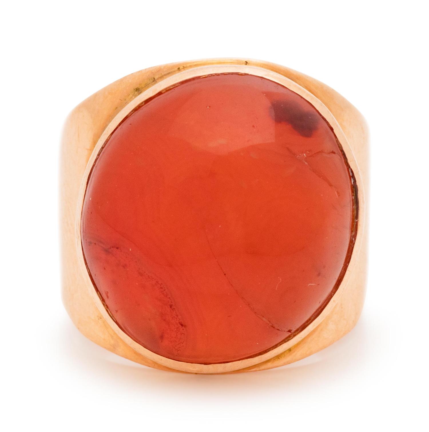 A Rose Gold and Red Hardstone Ring,