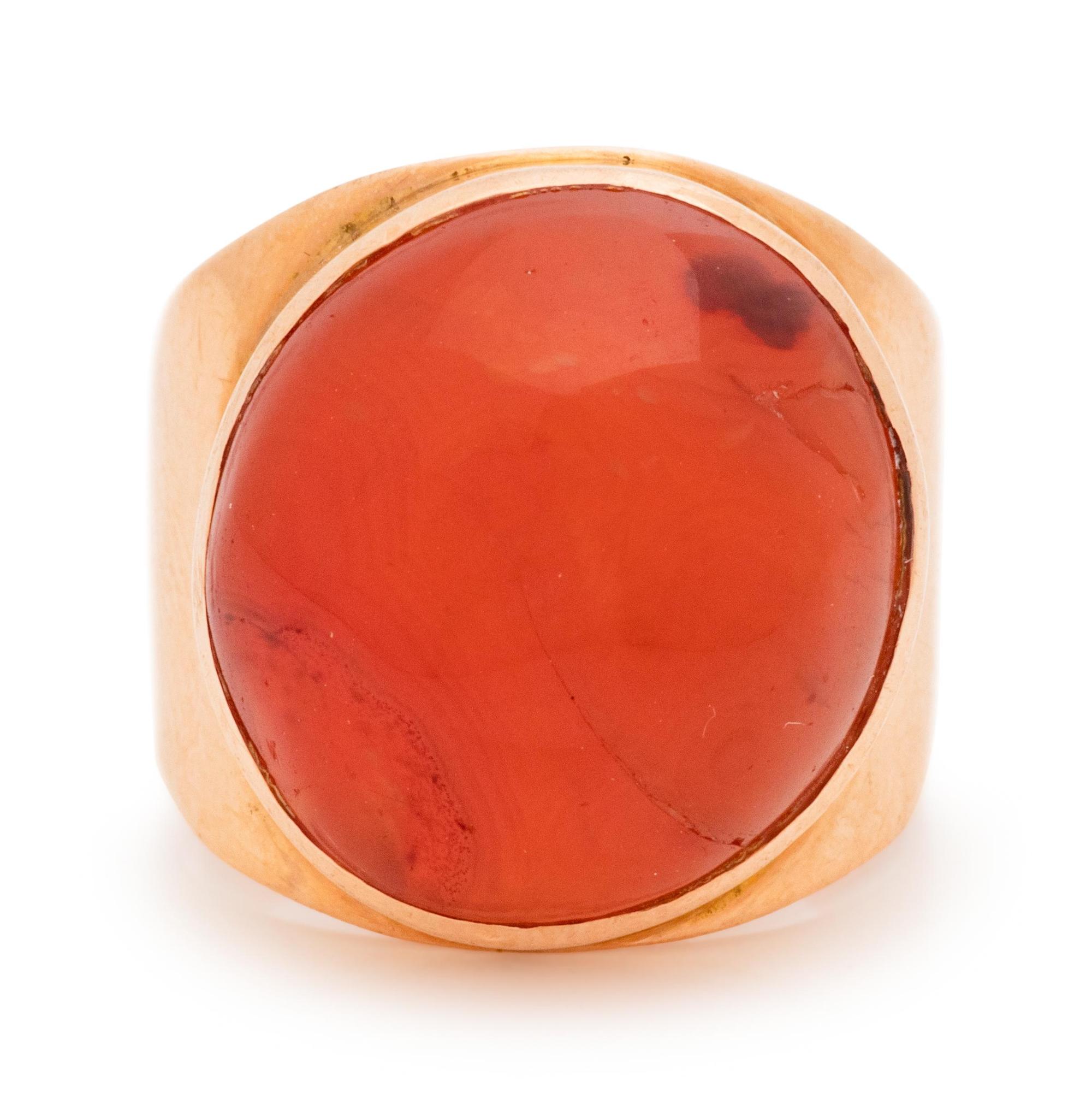A Rose Gold and Red Hardstone Ring,