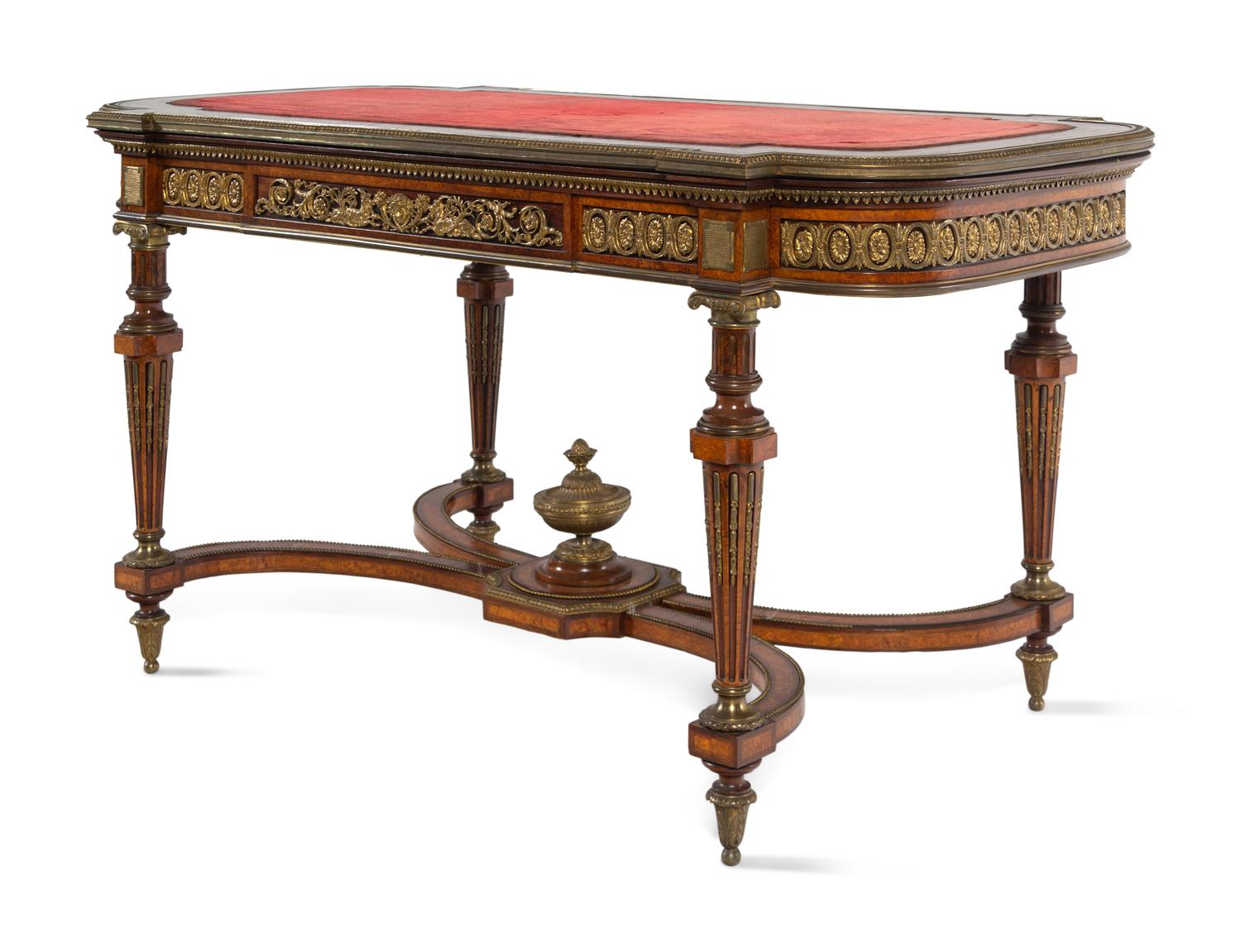 A Napoleon III Velvet-Inset and Gilt Bronze Mounted Amboyna Center Table