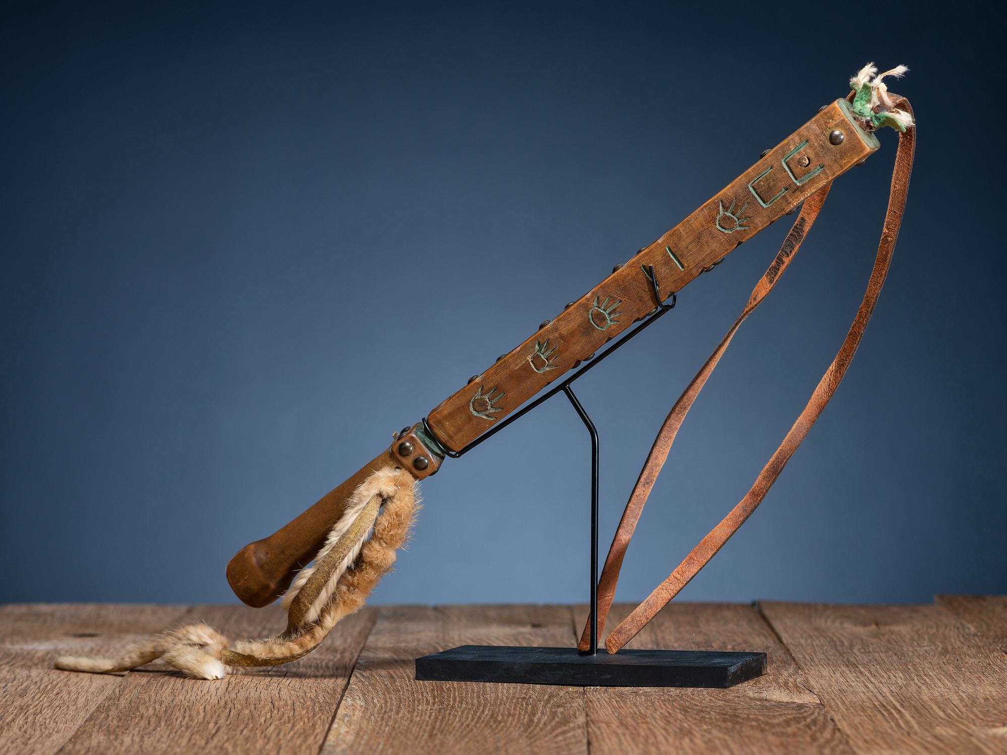 Plains Tacked Wood Quirt, with Hands and Horse Tracks