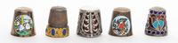 A Group of Enamel Decorated Thimbles Height of first 3/4 inch.