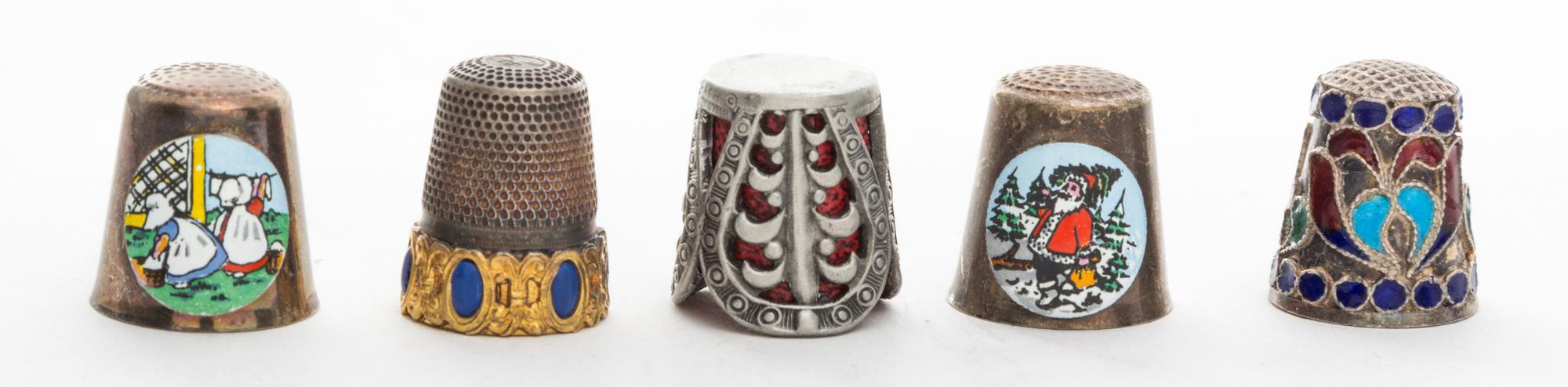 A Group of Enamel Decorated Thimbles Height of first 3/4 inch.