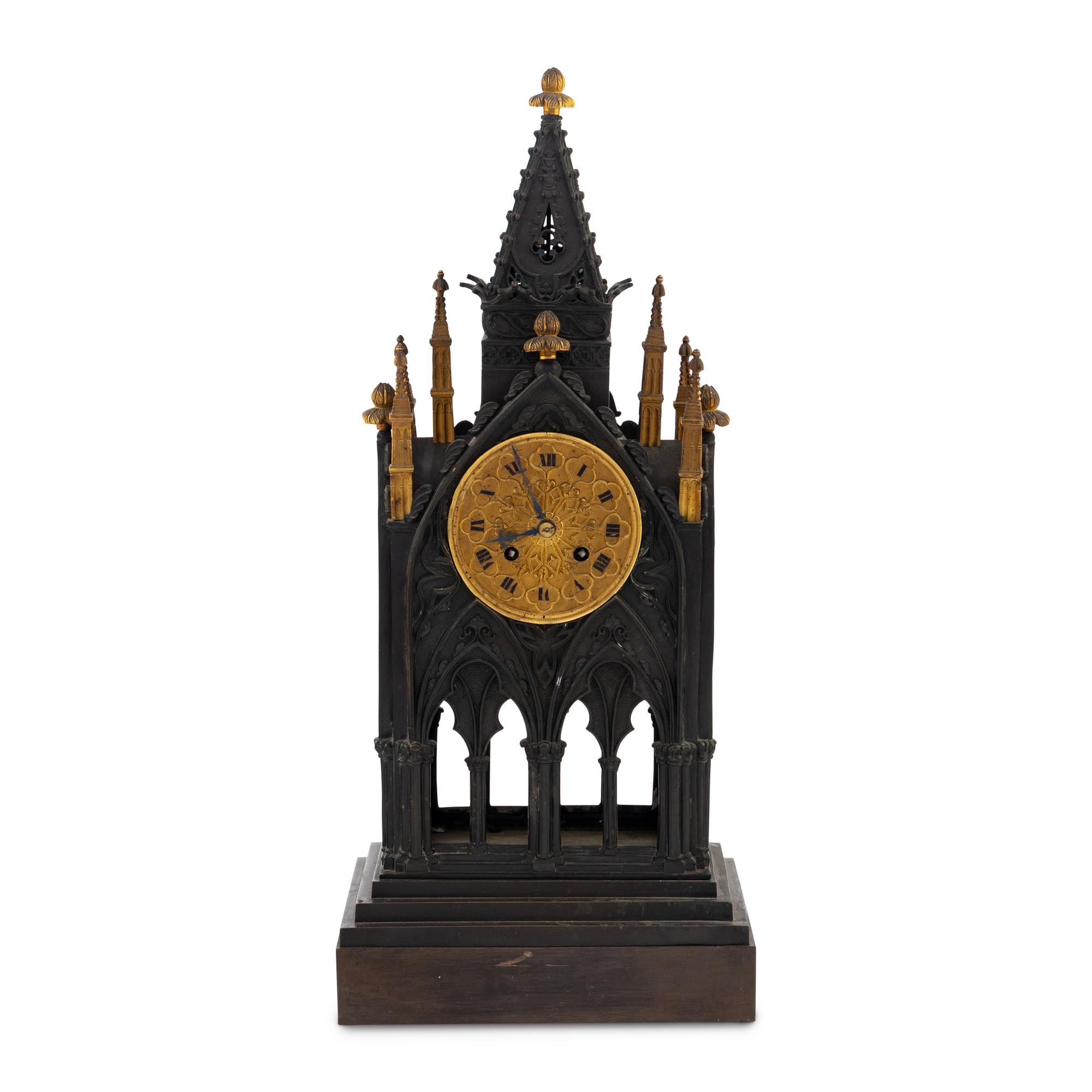 A French Patinated and Parcel Gilt Bronze Cathedral-Form Clock