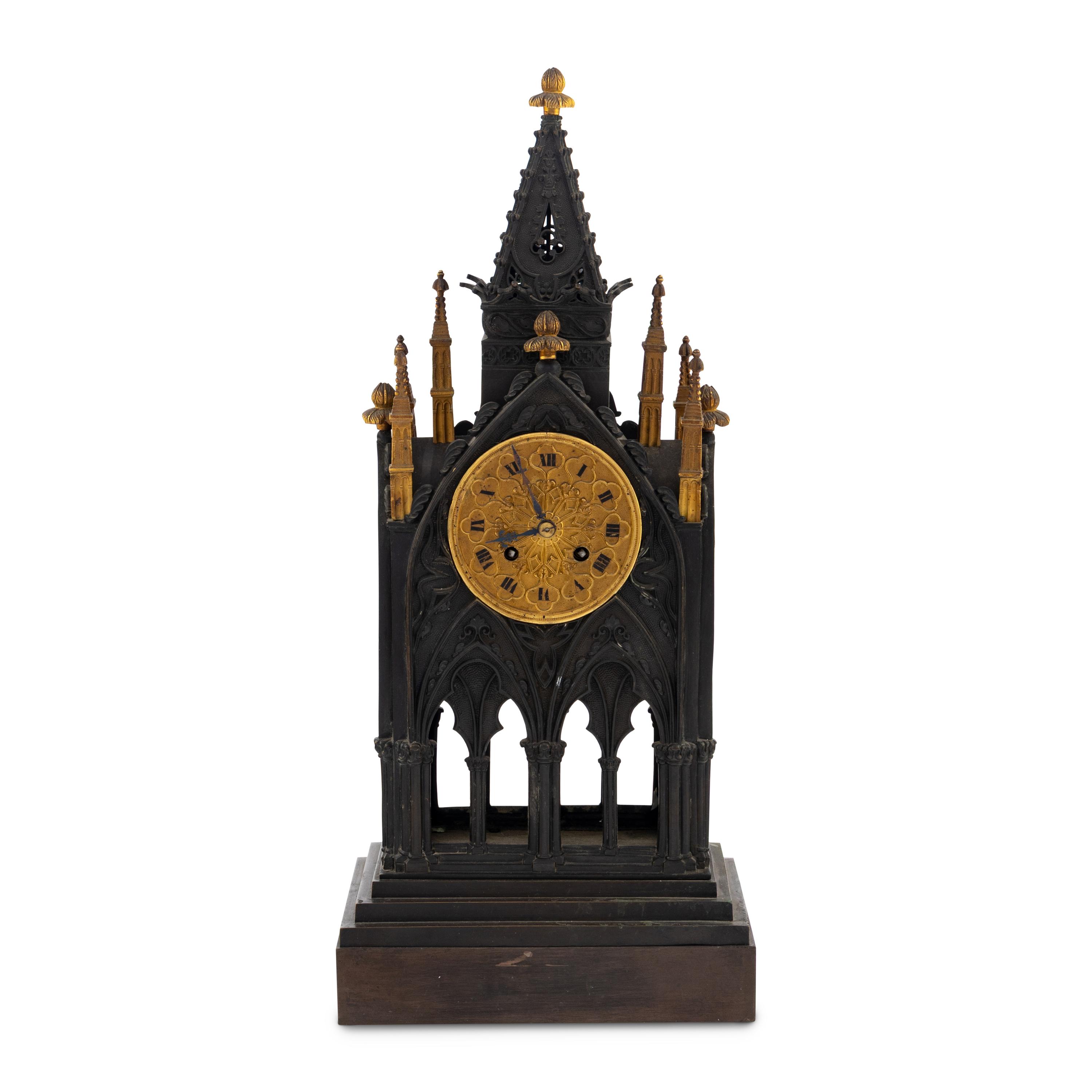 A French Patinated and Parcel Gilt Bronze Cathedral-Form Clock