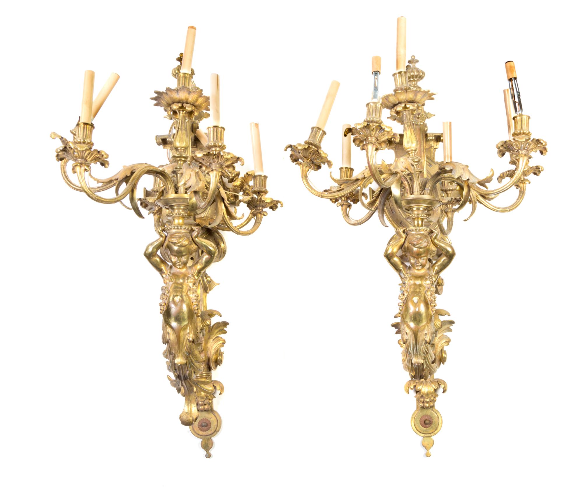 A Pair of Gilt Bronze Seven-Light Sconces Height 42 inches. — LATE 19TH CENTURY