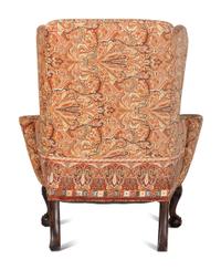A George III Carved Walnut Claw-and-Ball Foot Easy Chair