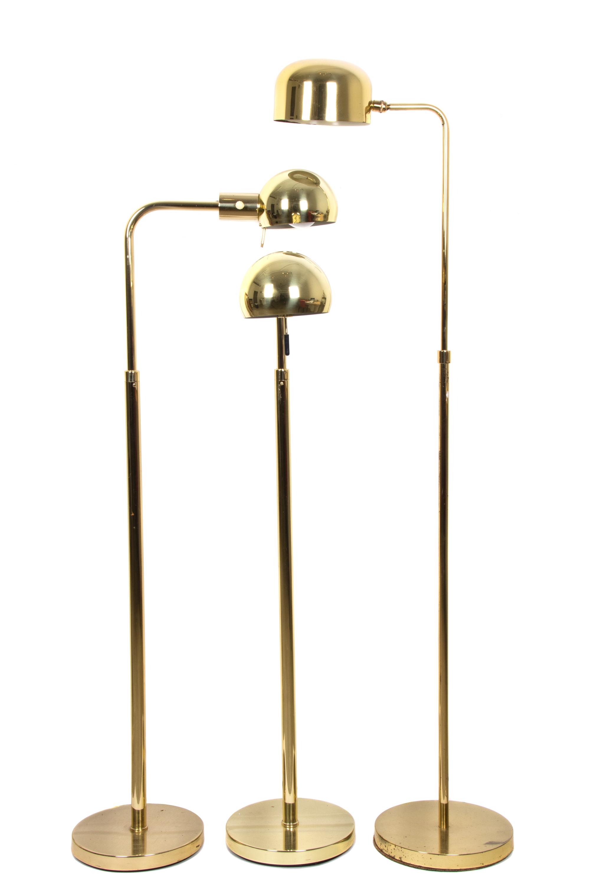 Three Brass Floor Lamps Height of first 40 inches.
