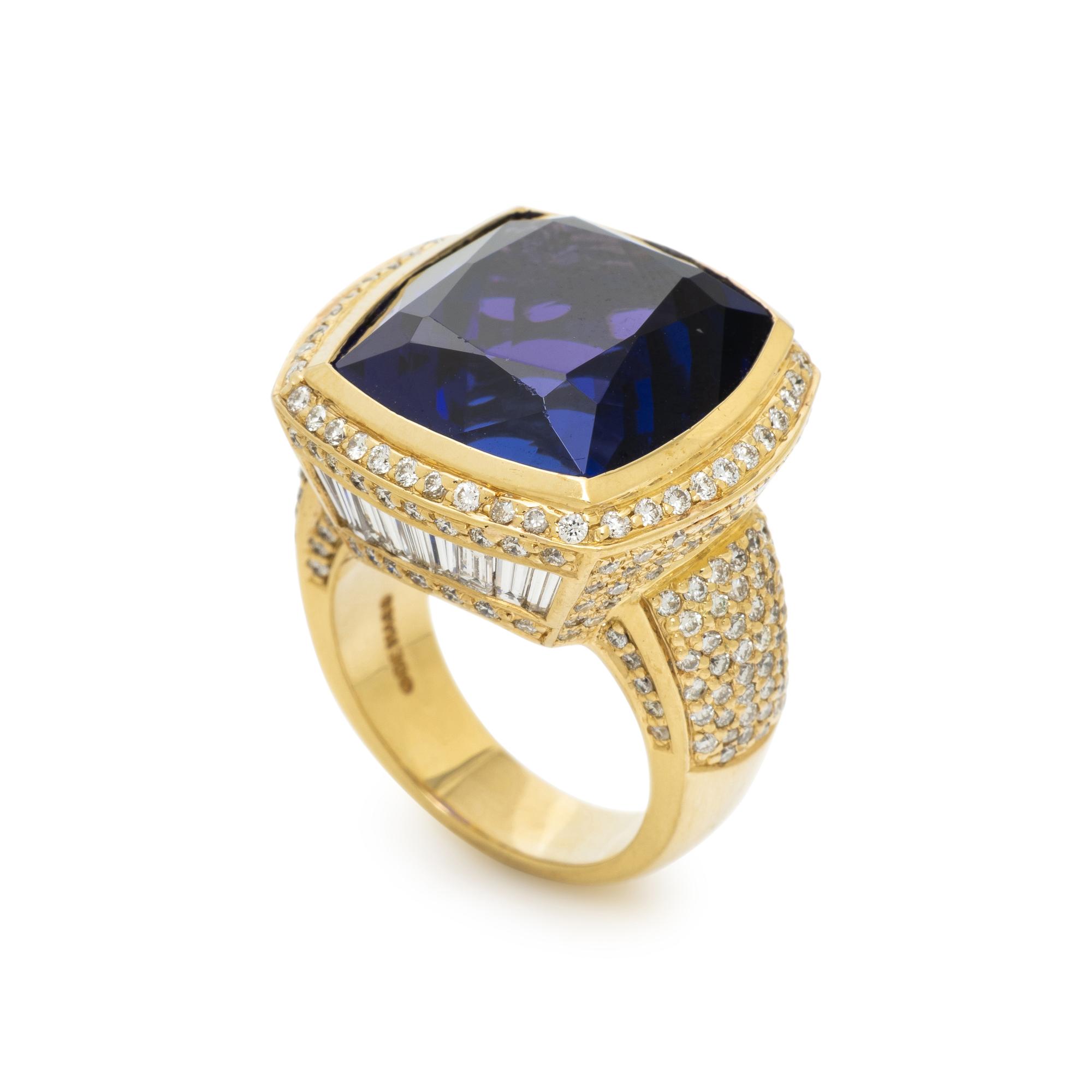 DE HAGO, YELLOW GOLD, TANZANITE, AND DIAMOND RING