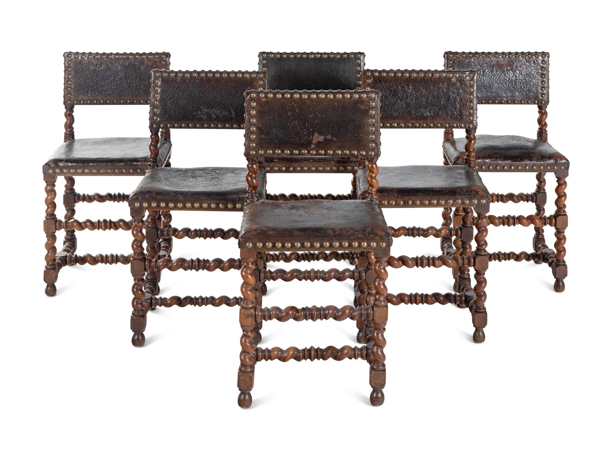 A Set of Six Spanish Baroque Style Walnut Dining Chairs