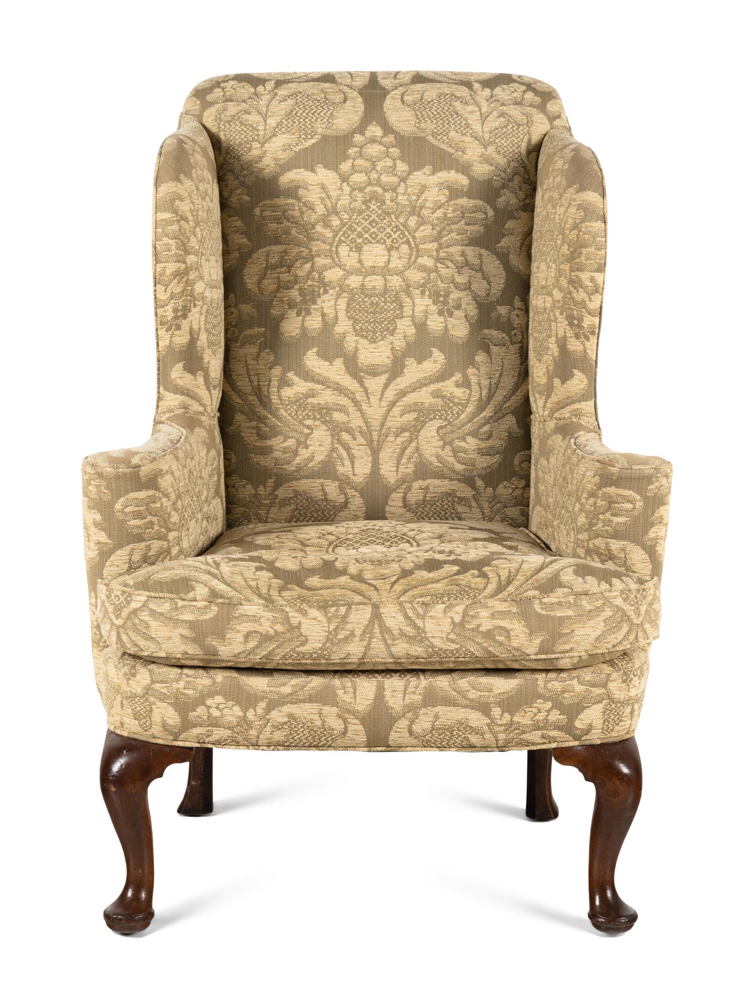 A George II Walnut Wingback Armchair